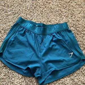 gymnshark training loose fit shorts; teal; medium